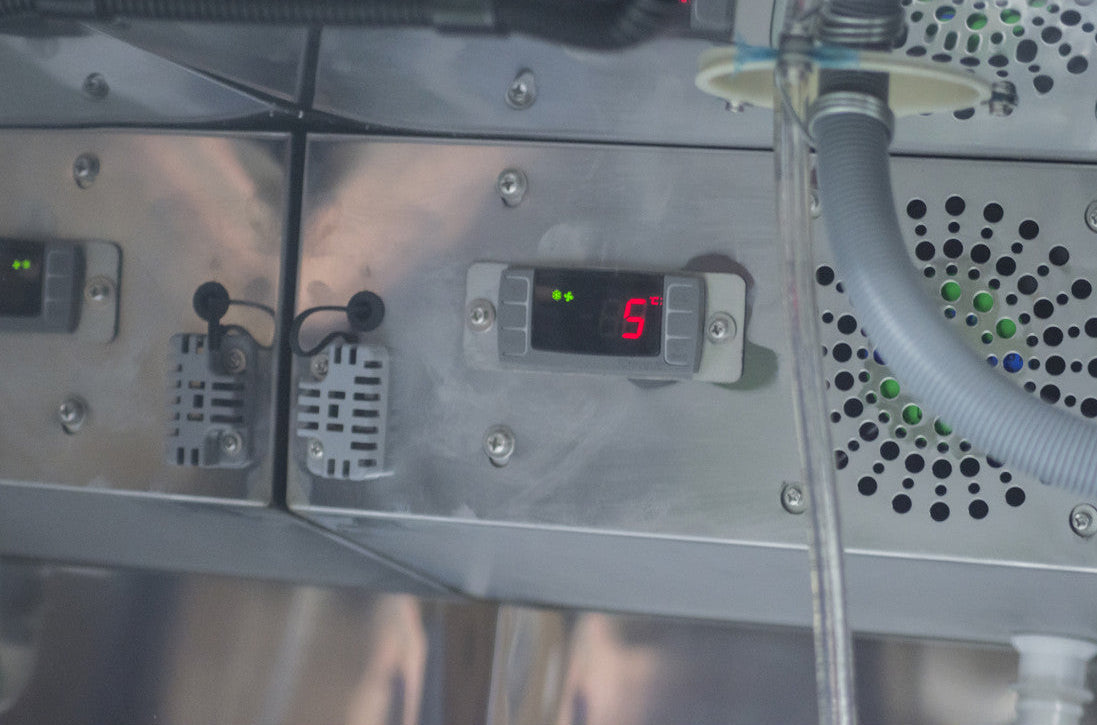 Interior control panel view of the Prodis single door portable keg cooler, highlighting digital temperature display and internal cooling components