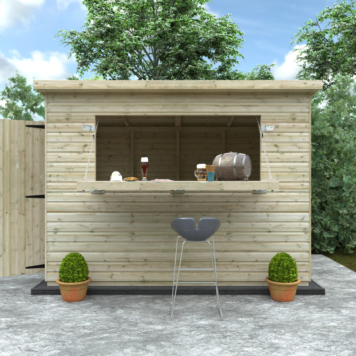 Front lifestyle view of the 10ft wide x 6ft deep Broadfield tanalised bar shed with serving hatch open, showing drinks set out and a relaxed garden bar setup