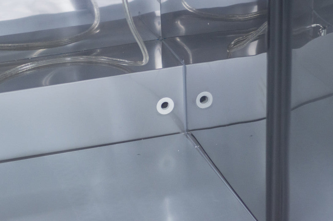 Interior view of the Prodis single door portable keg cooler, showing keg space, tubing layout and stainless steel inner walls for easy cleaning